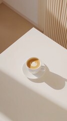 Minimalist cappuccino in sunlight on cream table – modern morning coffee aesthetic for lifestyle and branding use