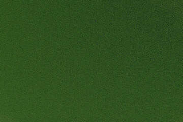 Close-up of green felt surface texture
