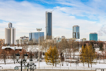 A city skyline with a tall building Iset Tower in the middle in Yekaterenburg in Russia