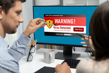 Virus warning alert on computer screen detected brisk cyber threat , hacker, computer virus and malware