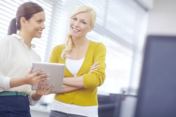 Women, together or leadership in office with tablet, working with technology for web design...