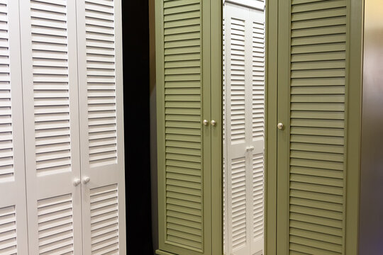 Modern cabinet with louvered doors