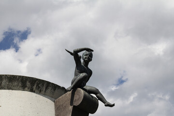 A close-up of an angel sculpture in Minsk, Belarus. The statue captures a peaceful, spiritual mood with detailed artistic features.
