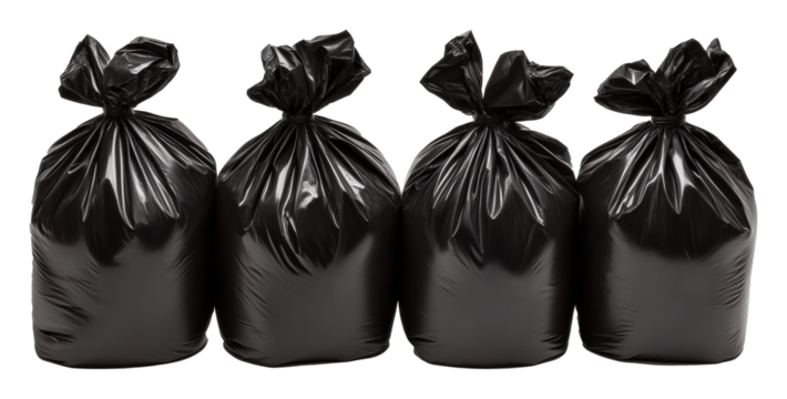 Four black garbage bags lined up neatly against a transparent background