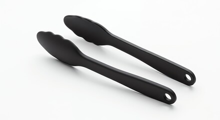 Obraz premium Black kitchen tongs