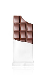 Broken chocolate in the wrapper, isolated on a white background