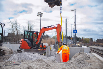 construction of a railway station platform in Canada