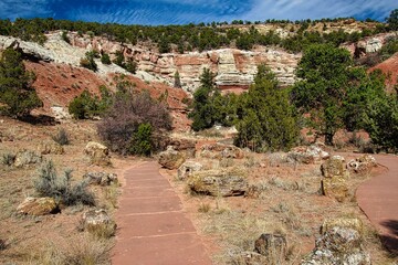On the Trail Hiking through Escalante Petrified Forest State Park in Utah.