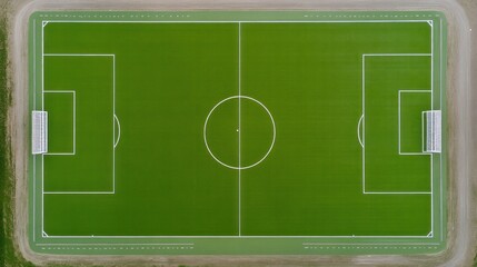Empty green soccer field aerial view