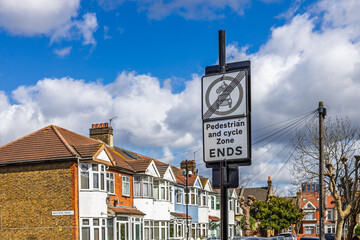 Traffic signs indicating pedestrian and cycle zone ends. London, UK, 24 March 2024 © SellStock