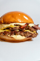 doble cheese bueger with bacon and chimichurri