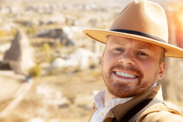 Young caucasian male enjoying Cappadocia valley of love