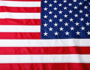 Obraz premium Stars and stripes ripple across the American flag, displaying patriotic pride and national identity in vibrant red, white, and blue.