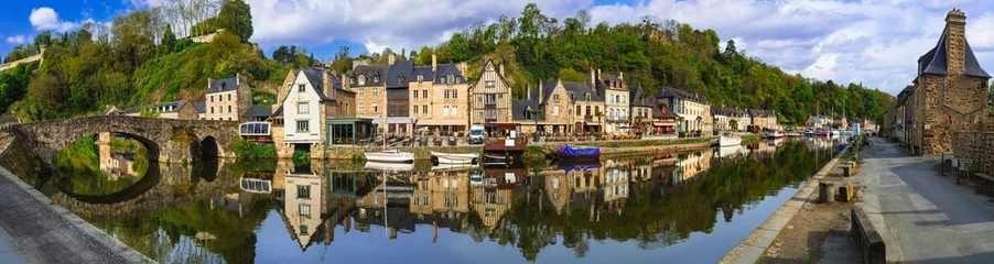 Fotobehang France travel, most scenic villages and  romantic towns of Brittany. Picturesque traditional port of Dinan with half-timbered houses, restaurants over canals © Freesurf