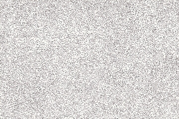 A textured gray fabric and white paper create a detailed, patterned surface