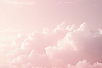 The image depicts a vast sky dotted with gentle, cotton-like pastel clouds, creating a tranquil and calming ambiance, perfect for moments of reflection and peace.