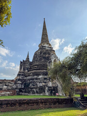 Ancient beautiful Wat Chaiwatthanaram Ayutthaya historic temple, brick towers glowing in the...