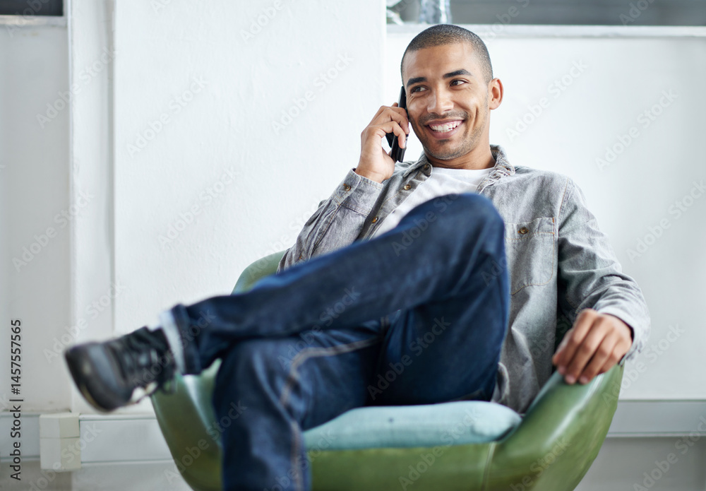 Poster Designer, man and relax in office or phone call for discussion, client communication and networking for agency. Male employee, cellphone and conversation for connection, thinking and speaking of work