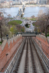 Buda Castle Funicular in Budapest, Hungary, bank of Danube river and Szechenyi Chain Bridge. Vertical image