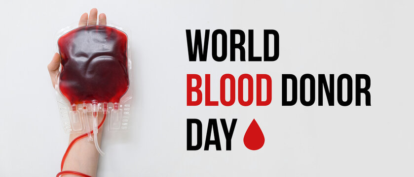 Female hand with blood pack on white background. World Blood Donor Day - Powered by Adobe
