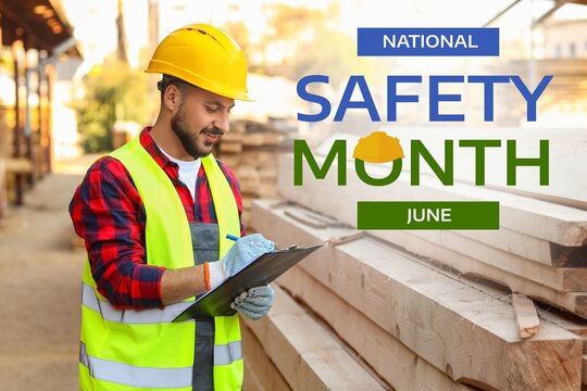 Male carpenter with clipboard working at sawmill. National Safety Month