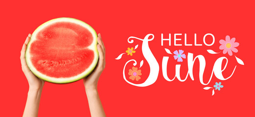 Female hands with half of sweet watermelon on red background
