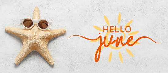 Plakat Starfish with sunglasses on white grunge background, closeup