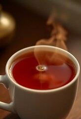 cup of tea with steam rising from it