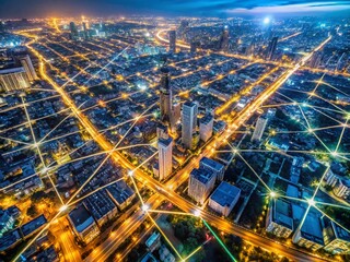 Obraz premium Aerial Night View: Illuminated Metropolis Skyline, City Lights, Urban Landscape, Night Cityscape, Glowing City