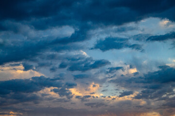 storm clouds in the sky at sunset