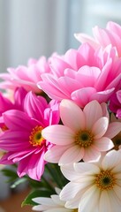 Fototapeta premium bunch of pink and white flowers in a vase