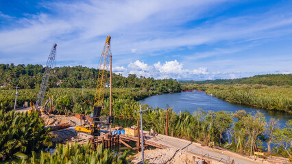 construction and reconstruction of a river bridge on a tropical island in the Philippines, drone view