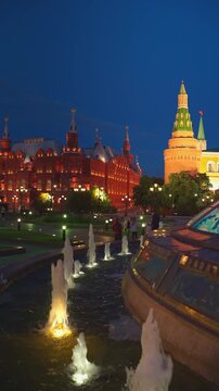 Moscow, RUSSIA - Aug 04 2021, 4k: Panoramic view on World Clock Fountain and the Historical Museum from Manezhnaya Square, vertical video, on Aug 04, 2021 in Moscow, Russia