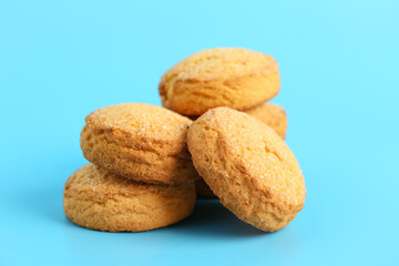 Many sweet cookies on blue background