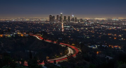 Fototapeta premium City Skyline at Night with Car Light Trails