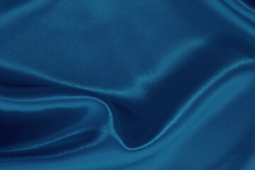Dark blue fabric cloth texture for background and design art work, beautiful crumpled pattern of silk or linen.