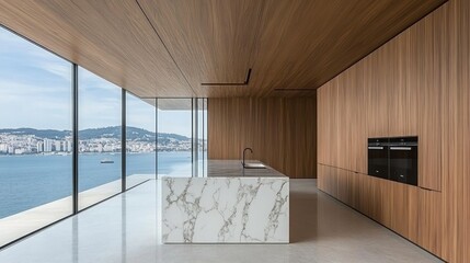 Modern, minimalist kitchen with expansive ocean views.
