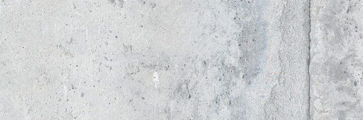 Texture of old cracked concrete wall. Rough gray concrete surface. The gap between the reinforced concrete slabs. Perfect for background and design. Close-up. High resolution.
