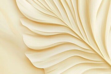 Ornate, pale yellow relief carving of a stylized leaf.