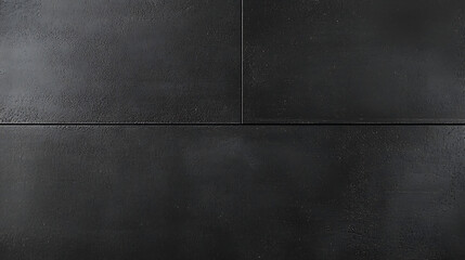 A black tile floor with a shiny, wet look