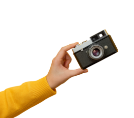vintage camera held in hand Isolated on Background