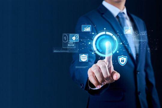 Businessman interacts with a futuristic digital interface, showcasing data analysis, security, and strategic planning concepts.  The image symbolizes modern business technology and innovation.