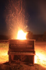How to Burn a Piano