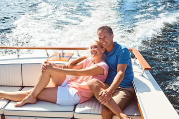 Boat, cruise or luxury with mature couple at sea together for holiday, getaway or vacation for...