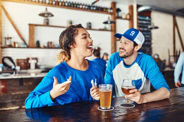 Sports, talking or couple in pub with beer, popcorn or social celebration of competition event together. Relax, game or people in bar for watch party, alcohol drinks or fans at diner for happy hour