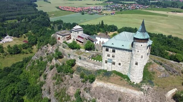 Kuneticka Hora Castle on The Hilltop In Summer In Raby, Czech Republic. - aerial shot