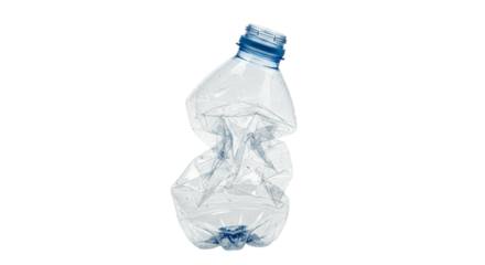 Crushed plastic bottle against black backdrop