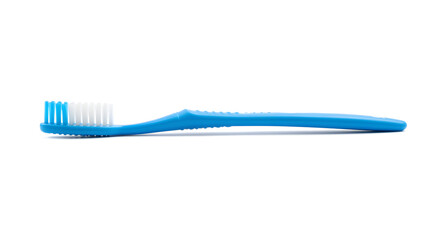Isolated Blue Toothbrush with White Bristles on a Clean White Background for Dental Hygiene and Oral Care Purposes