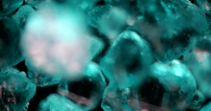 Industrial applications of nickel sulfate crystals. Macro view shows vibrant green crystals used in metal finishing and chemical processes