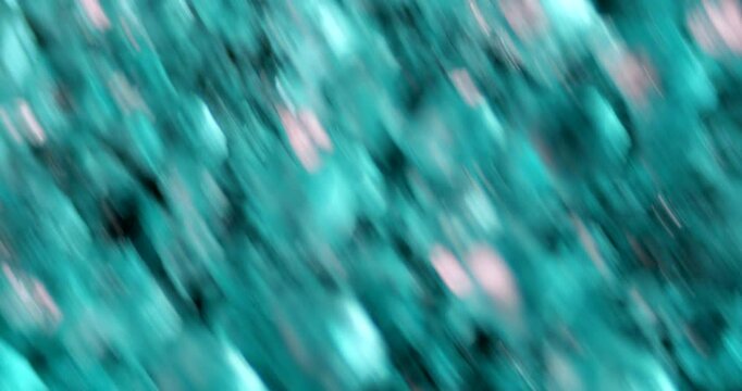Nickel sulfate crystals under microscope with industrial uses. High magnification reveals green crystalline structures for electroplating and battery production